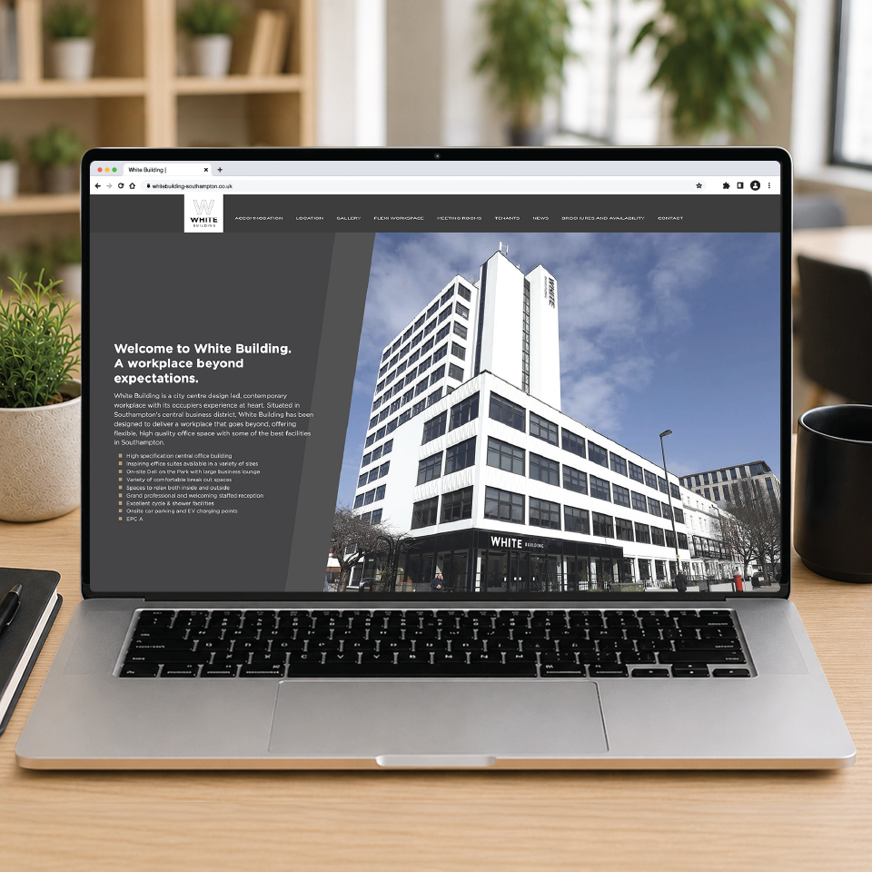 White Building Labtop Website
